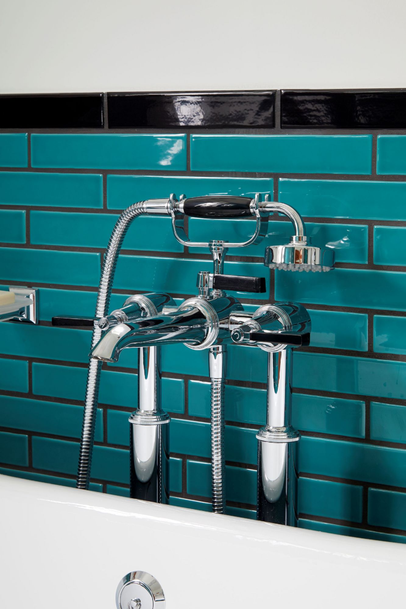 Shop the Samuel Heath Style Moderne Bath Shower Mixer, featured above in a North London bathroom renovation, recently designed by C.P. Hart. Please click here to explore this bathroom.