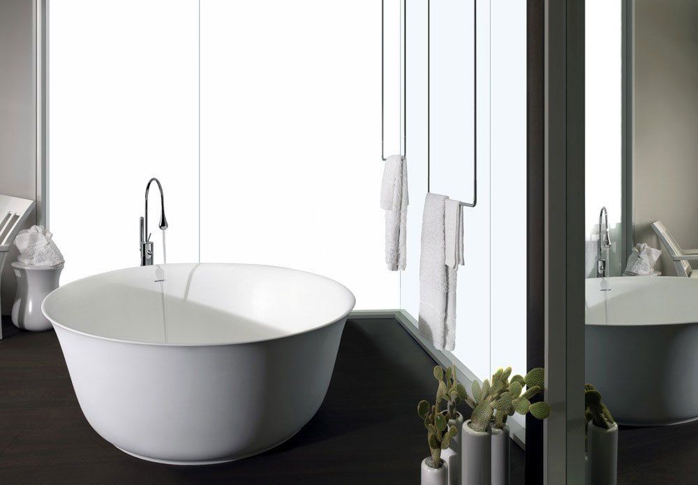 Shop the Gessi Goccia Thermostatic Freestanding Bath Shower Mixer, featured above in the chrome finish.