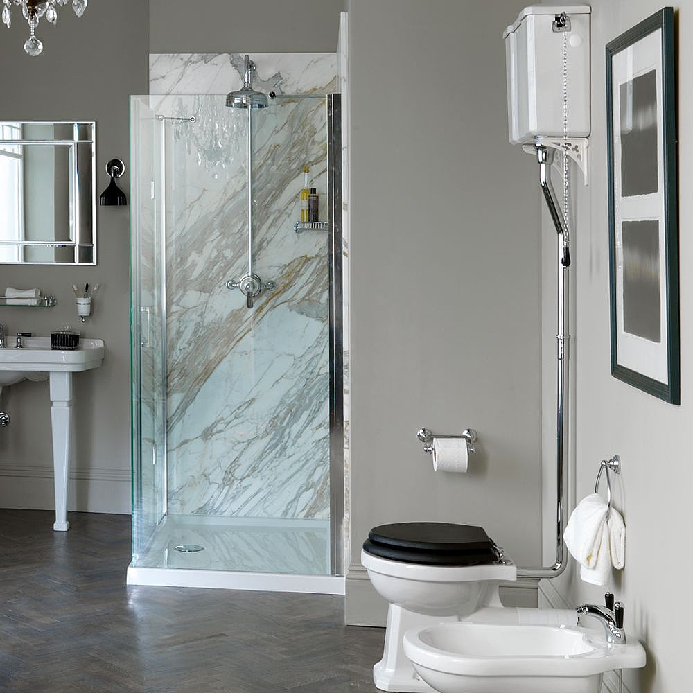Shop the London High Level Toilet, featured above in white with the black London Soft-Close Toilet Seat