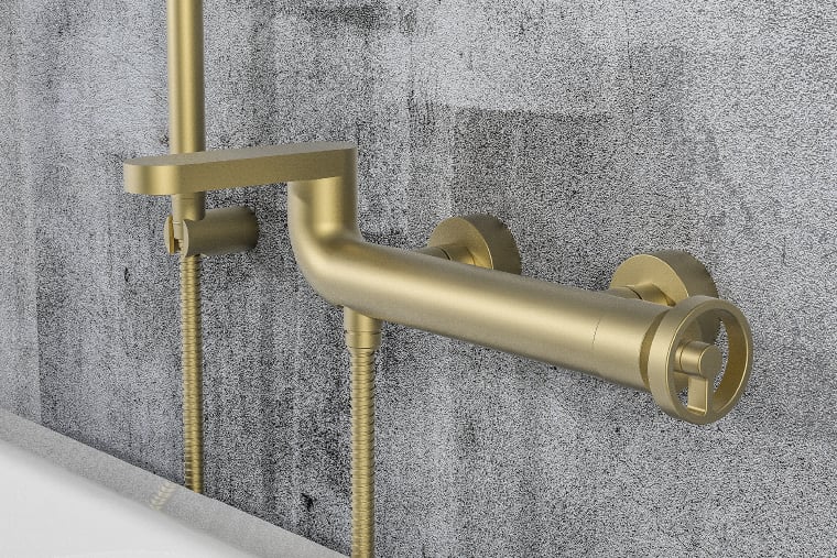 Shop the P1 Exposed Manual Bath and Shower Mixer with Manhattan Handle, featured above in the soft brass finish.