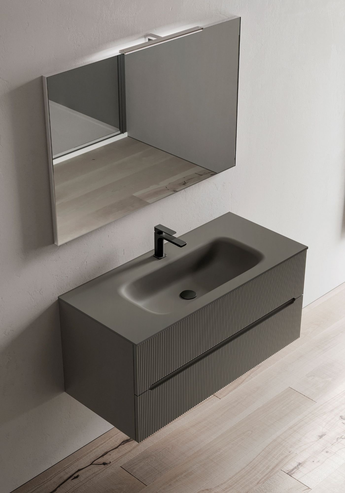 Smyle vanity unit in fluted lacquered finish with integrated twin basin.